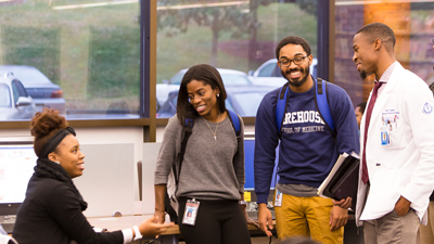 a group of students talking together