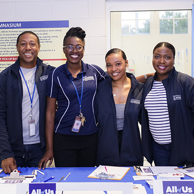 a group shot of people smiling