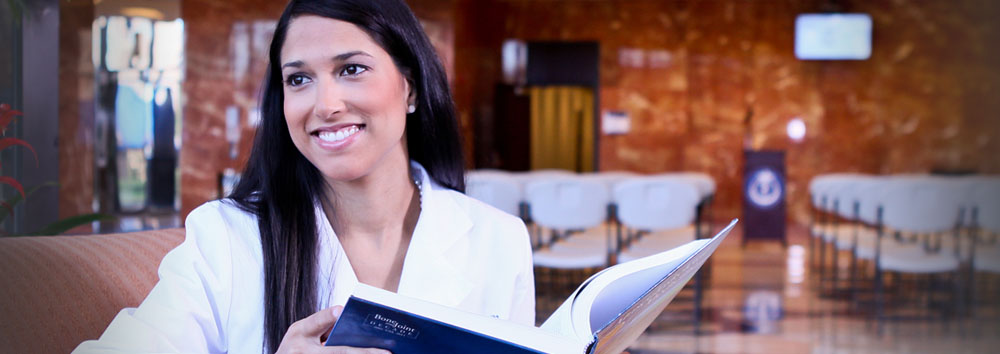 A woman holding a book